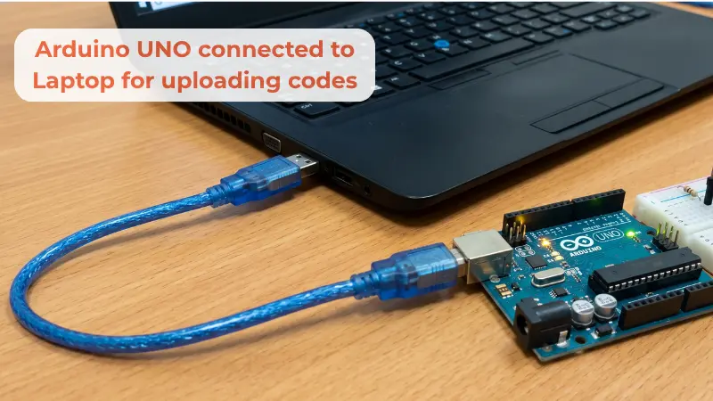 Arduino UNO connected to Laptop via USB for uploading codes